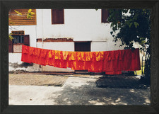 Orange Robes Drying Framed