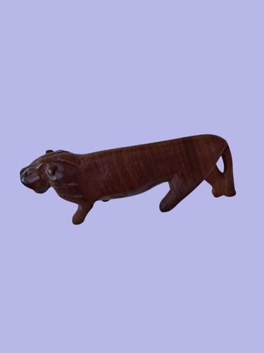 Hand carved dark - hand, lion