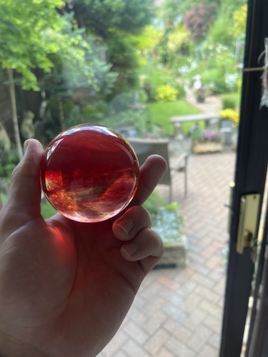 Heavy red art glass sphere - heavy,