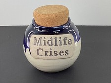 Handcrafted pottery jar with cork stopper midlife crisis