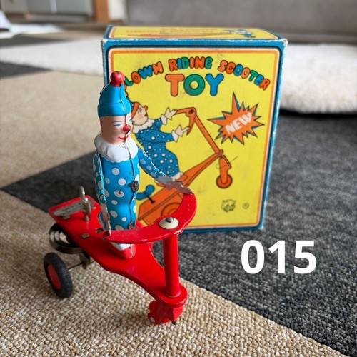 Clown riding scooter - clown,
