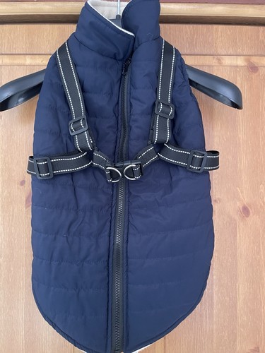 Dog coat with - attached, harness