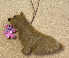 NORWICH TERRIER with a PINK