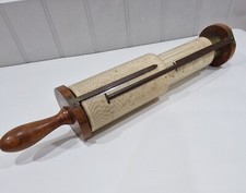 A FULLER'S SPIRAL CYLINDRICAL SLIDE RULE CALCULATOR 