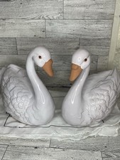 These white glazed terracotta