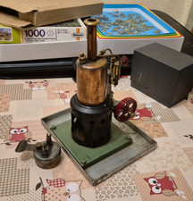 A vintage live steam vertical engine