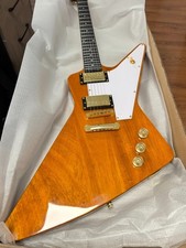 Yellow Explorer electric guitar with HH gold pickups and black fretboard