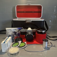 Vintage Yashica TL-Electro 35mm SLR Camera with accessories and a bag mint