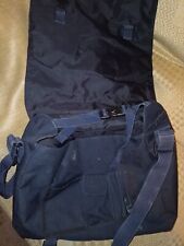 Black and cream/ white Nike shoulder / record bag. With adjustable straps 