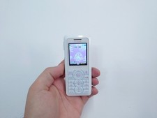 Sagem my700xi White (Unlocked) Mobile Phone slim basic classic film prop movie