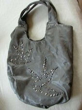 Oushka Grey leather shopper / tote bag, with studded swallow design