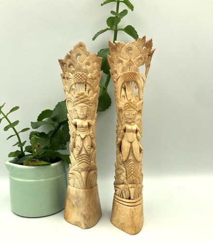 Vintage carved totem poles - carved,
