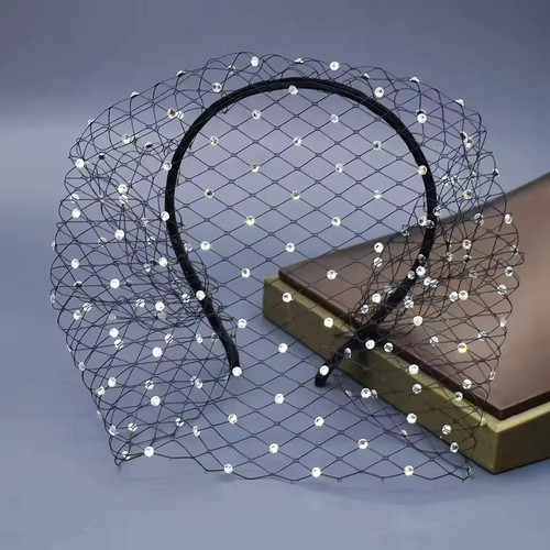 Black fascinator with netting
