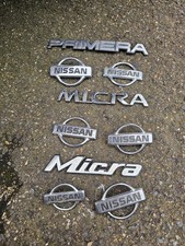 Large Job lot of Nissan badges including Micra&Primera