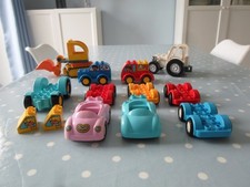 11 LEGO DUPLO VEHICLES INCLUDING LARGE DIGGER AND TRACTOR