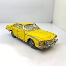 CORGI BUICK REGAL WITH JACKED