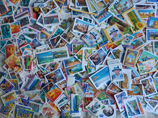 Package with $A1,000+ Canadian stamps unfranked not cancelled on/off paper/