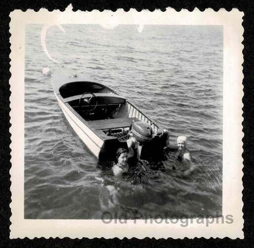 Lake swimming next - swimming, outboard