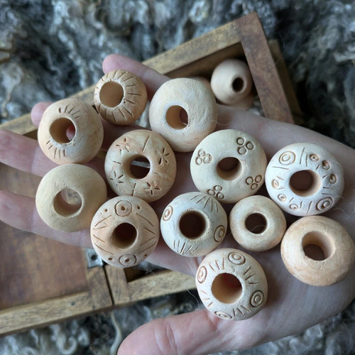 One hand made clay - one,
