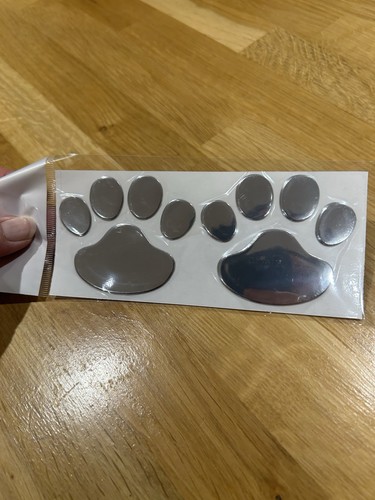 Silver paw print car - print,