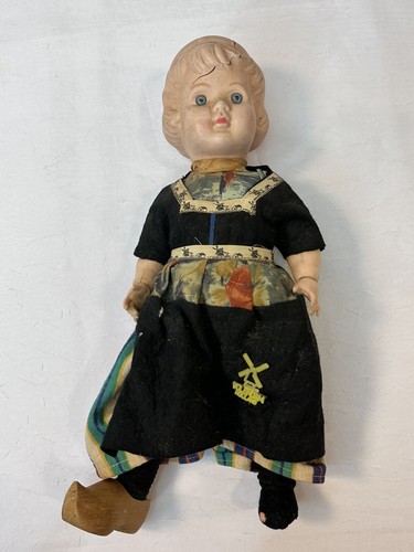 Creepy doll with cracked head - creepy,