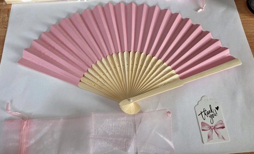 Paper fans hand - paper, held
