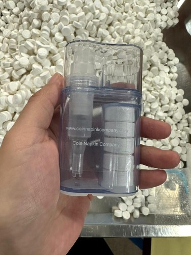 Compressed towels dispenser - compressed,