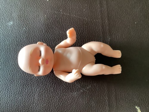 Baby doll sleeping - hard, body