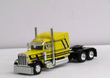 DCP yellow/black Peterbilt 379 63" midroof sleeper tractor new no box 1/64