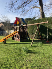 Wooden climbing frame with Swings Playhouse, Slide, climbing wall, firemans pole