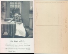 Elderly woman reading old