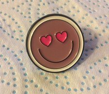 Smiley face enamel pin badge.