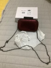 Clutch bag in dark red print