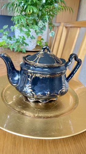 Vintage black and gold painted