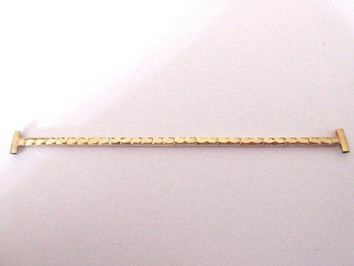Ladies gold tone expanding - tone,
