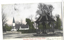 Printed postcard of the Ickenham pump and church  London in good condition