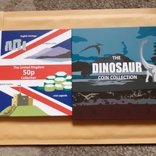 two 50p collectors coin albums each album holds 9 50p coins