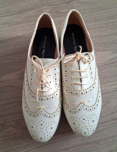 Oriental traffic white wingtip - traffic,