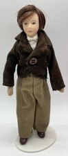 Dolls house reduced young man