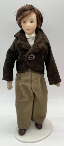 Dolls house reduced young man