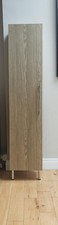 NEXT oak-effect tall bathroom