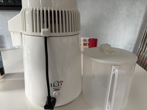 Water distiller and jug - and,