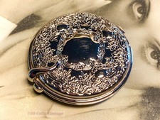 Small silver tone rococo style