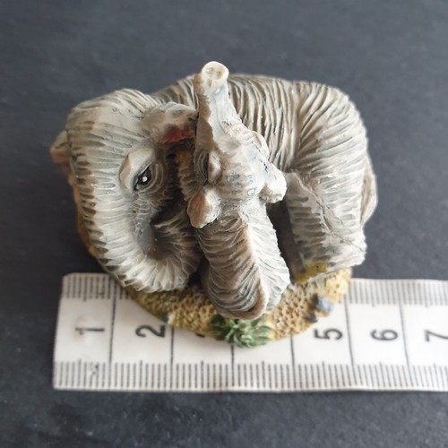 Elephant calf figurine - &,