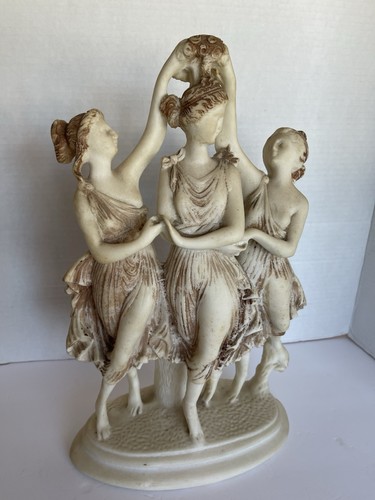 Three graces statue - three,