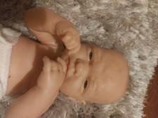 Reborn Baby Girl with lovely expression. No blemishes .
