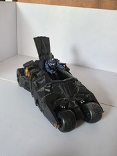 Batmobile + Batman figure.  Black Batmobile tumbler, plus 5" figure