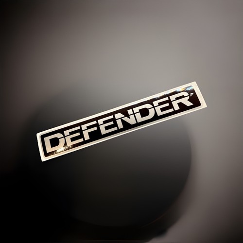 Genuine defender badge front - badge,