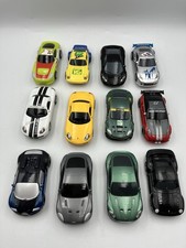 Micro Scalextric 12 x high perfromance racing cars  scale 1/64   12 volt