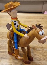 Disney Pixar Toy Story Articulated Figures of Woody And Bullseye. (GAR)